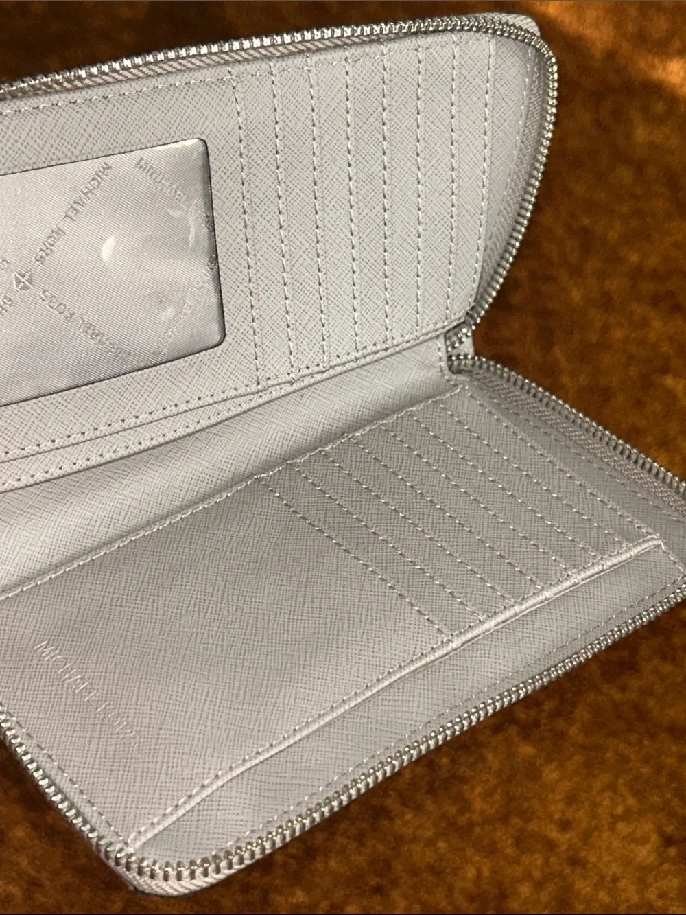 Michael Kors Light Silver Wristlet Wallet